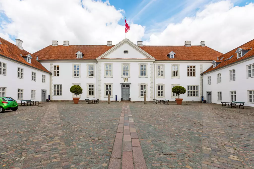 Courtyard of Odense Palace, former monastery building today being used by municipal government of Odense, Denmark