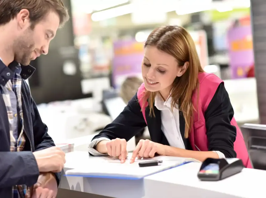 assistant giving information to customer